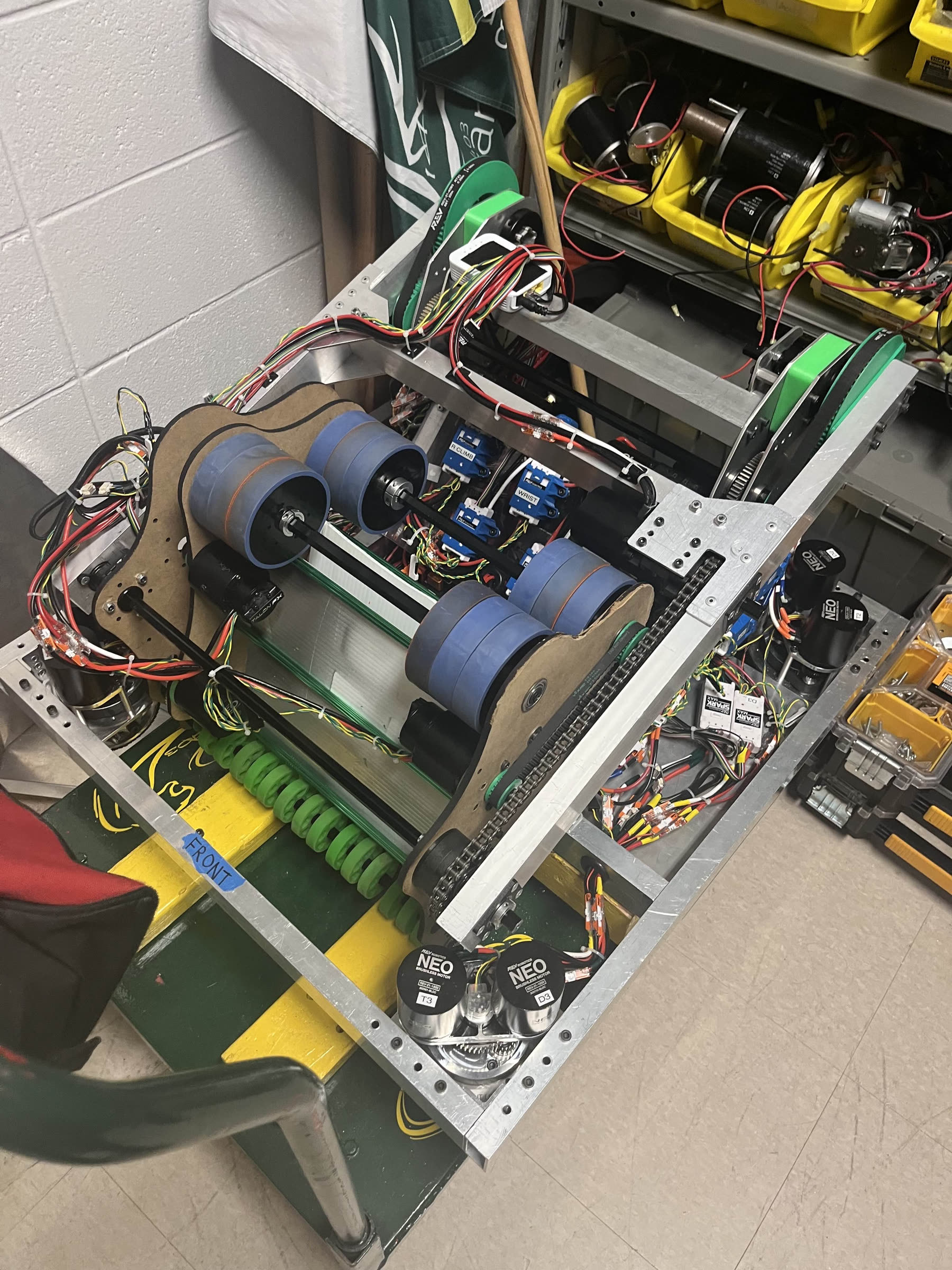 The same wood prototype bolted onto the robot for on-robot testing