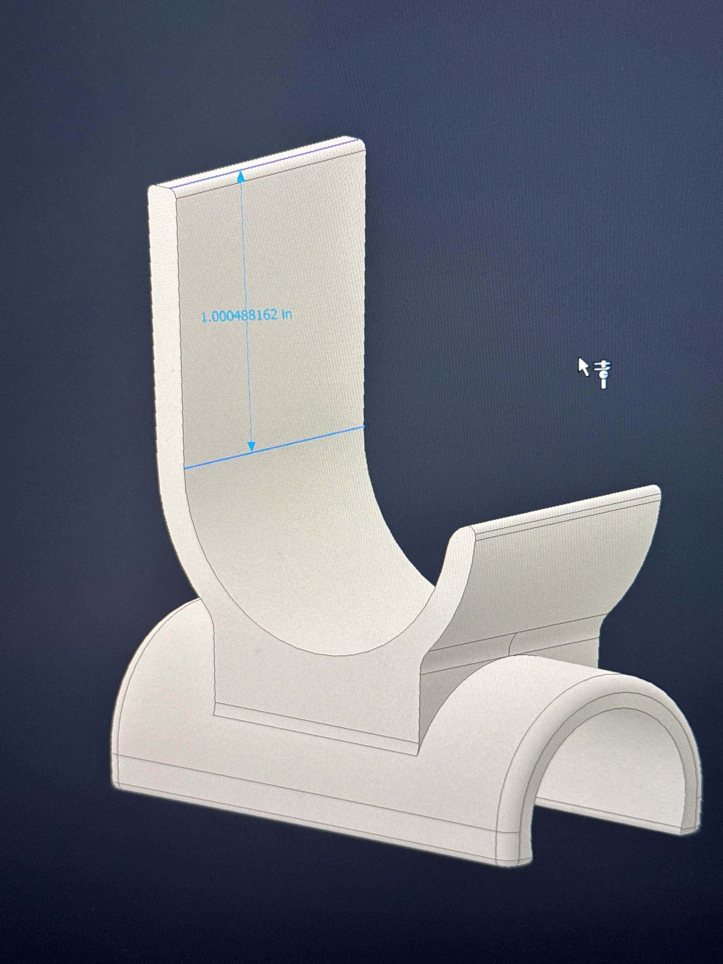 CAD model of the cane-to-wheelchair holder, showing the curved channel that grips the cane and the mounting base